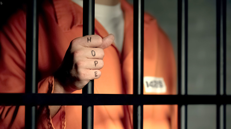 Hands of the prisoner in jail