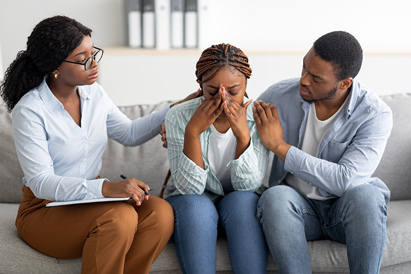 Young African American couple with a mental health therapist