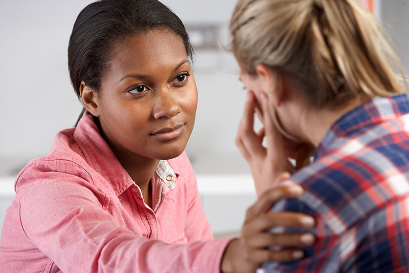 Teenage Girl Visits Therapist's Office Suffering with Depression